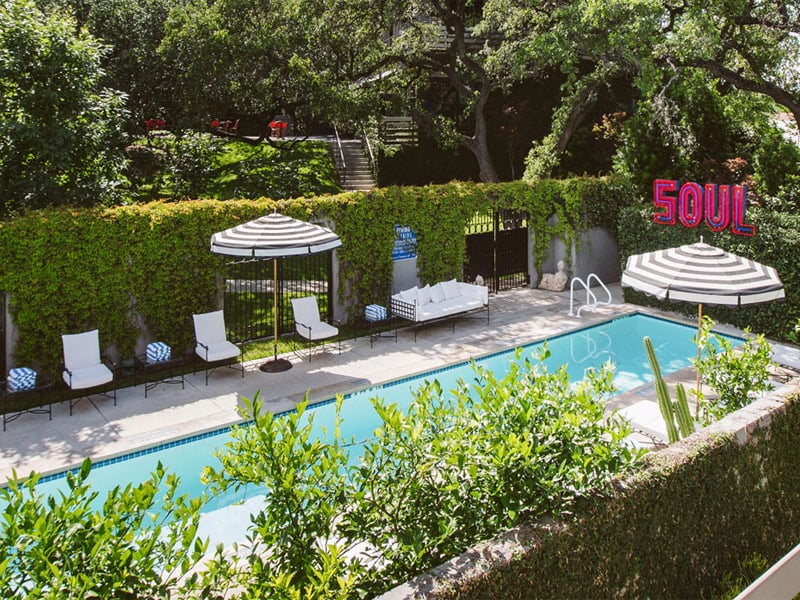 A view of the secluded pool and lounge chairs at Hotel Saint Cecilia