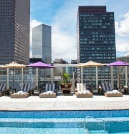 rooftop pool with loungers set amidst the denver cityscape