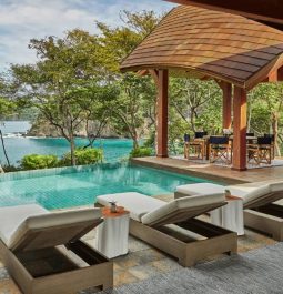 pool with lounges with cabanas at four season