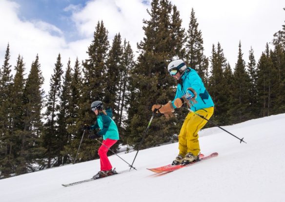 adult and child skiing at ski cooper