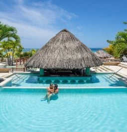 massive resort pool with swim up bar