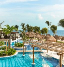 view of pool and cabanas at resort in Mexico