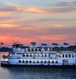 sunset sky over the Georgia Queen floating on the river