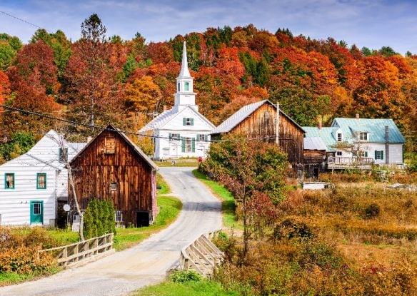 autumn foliage surrounding rural Vermont village
