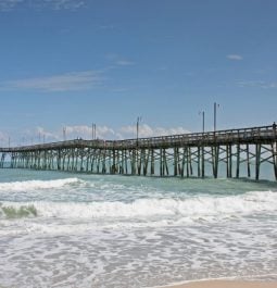 pier at topsail island with waves