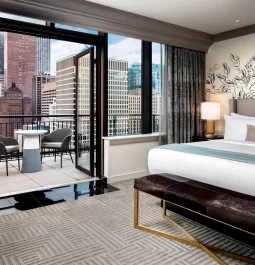 guest room at luxury Chicago hotel with outdoor patio