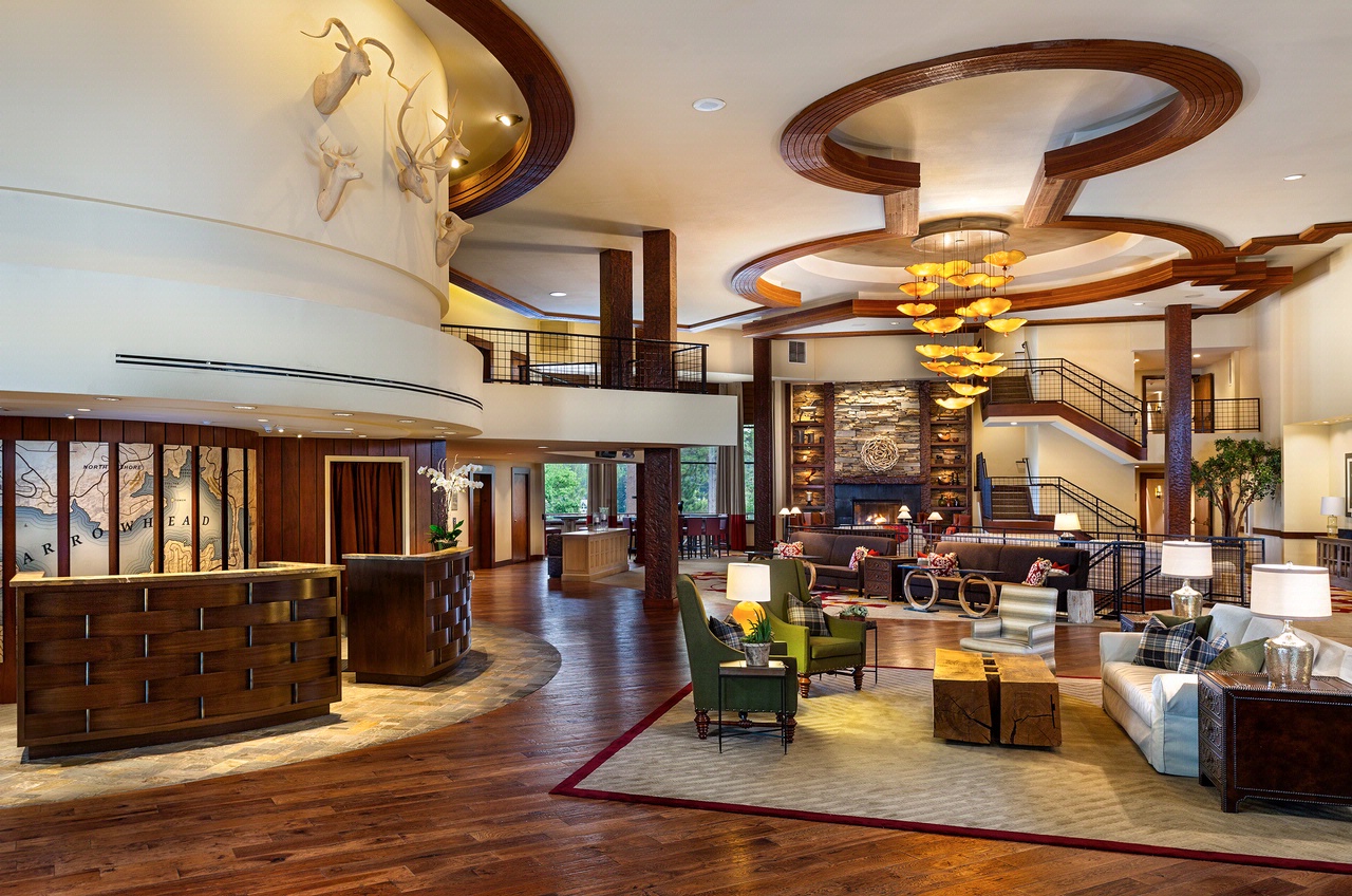 Elegant lobby with seating and high ceilings