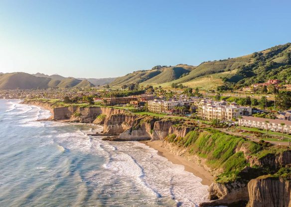The ocean meets the cliffs of the shoreline at the Dolphin Bay Resort and Spa in California