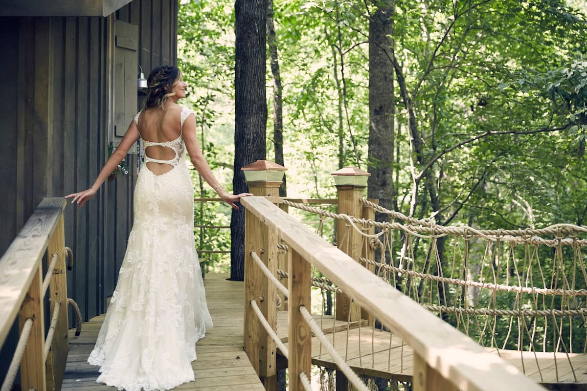 beautiful bride enjoying a magical treehouse