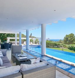 Villa terrace with a pool and a sea view