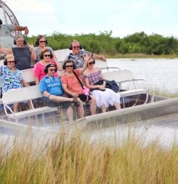 Guests on an airboat tour in the Everglades