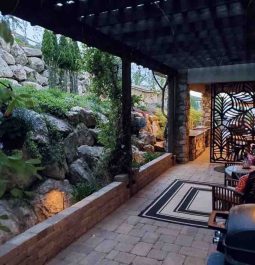 stone covererd patio with rocky landscape