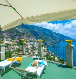 Terrace with sunbeds overlooking Amalfi coast
