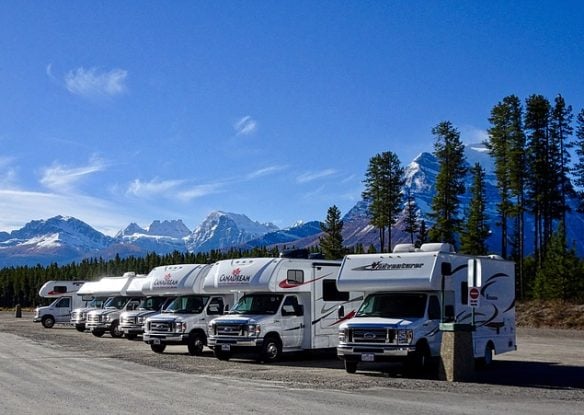 Campers lined up with mountains in back