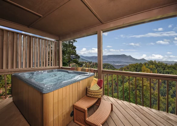 hot tub on deck with views of the valley and mountains