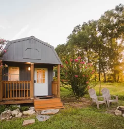 Cute tiny cabin at sunset