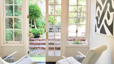 Bright interior space looking out patio doors