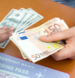 Close up of Euro to Dollar money exchange at airport
