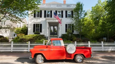 white building with red truck at 76 Main in Nantucket