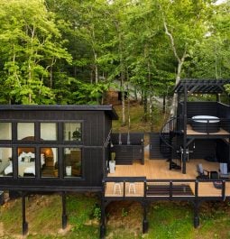 Aerial view of the cabin with a hot tub