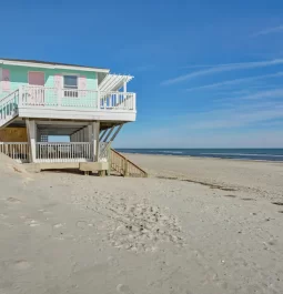 Sandy beach with beach house