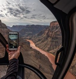 capturing a photo of the Grand Canyon from a helicopter