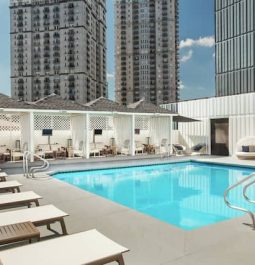 Pool with skyscrapers in background