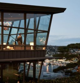 restaurant with glass walls overlooking harbor