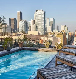 Hotel pool deck with a Downtown LA view