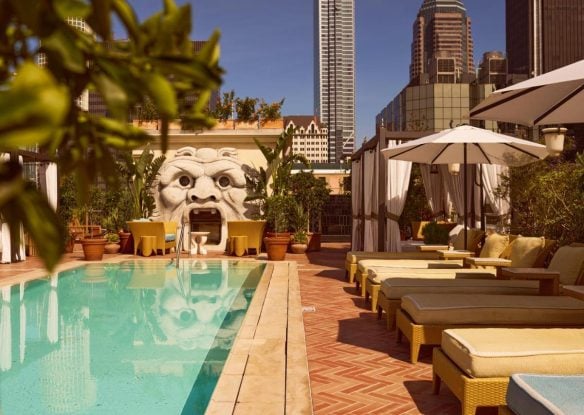 Rooftop pool with a head sculpture in DTLA