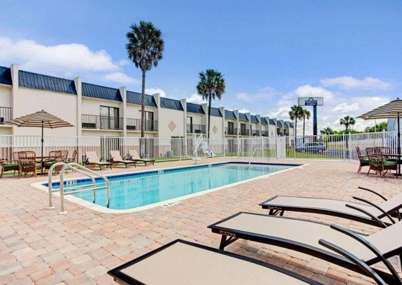 outdoor pool at Days Inn & Suites by Wyndham Tampa near Ybor City