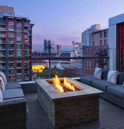Hotel terrace with a fire pit overlooking the stadium
