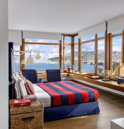 Maritime-themed hotel room with sea view