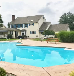 Pool with house in background