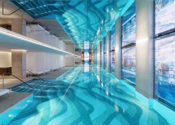 View of an indoor pool at a hotel spa