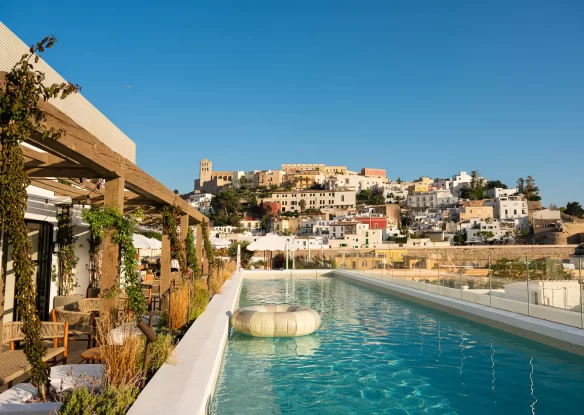 Hotel rooftop pool with the view of Ibiza Town