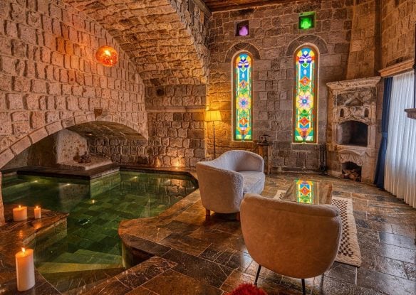 cave suite with private indoor pool and stained glass windows